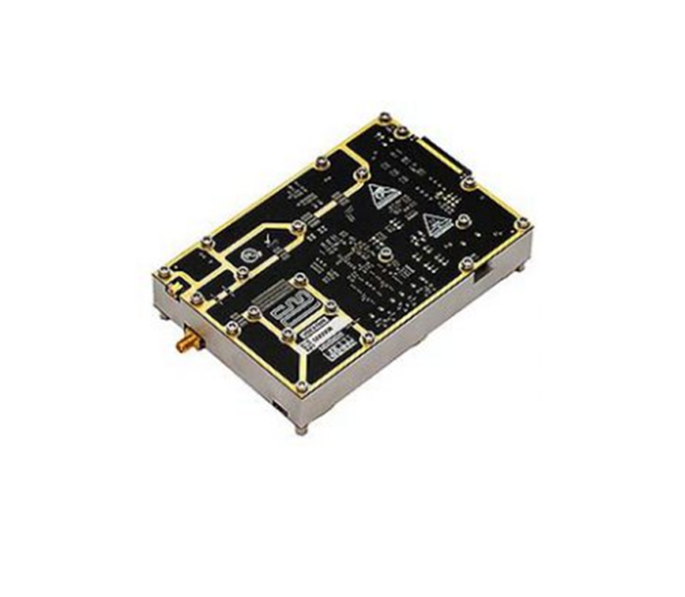 Photograph of a metal-cased RF module with a black PCB, gold-plated mounting screws and an SMA antenna connector, viewed at an angle